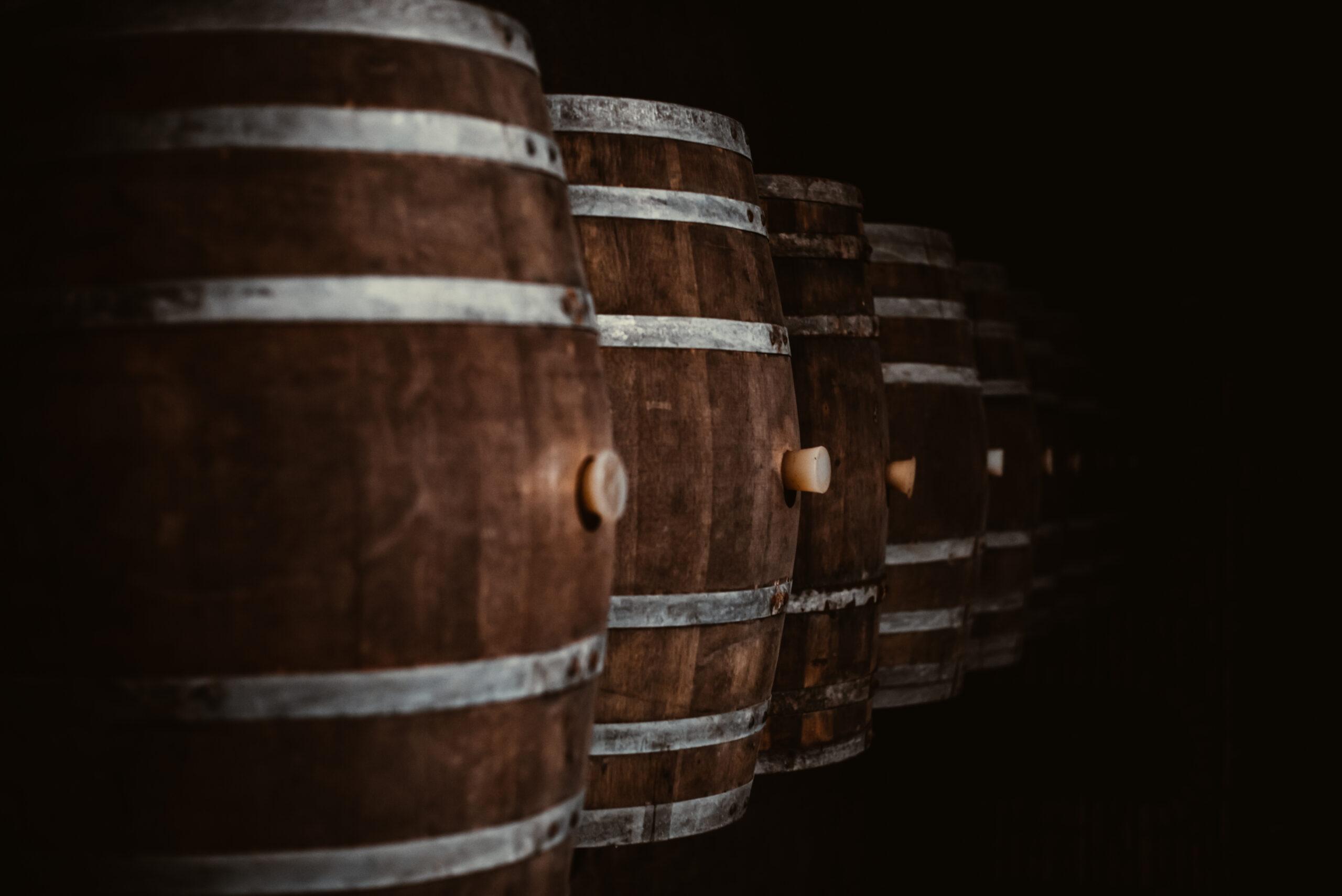 vintage old oak barrels of wine cognac in the win 2023 11 27 04 56 34 utc scaled