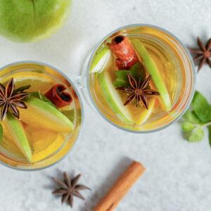 close up photo top view two glass apple cocktail